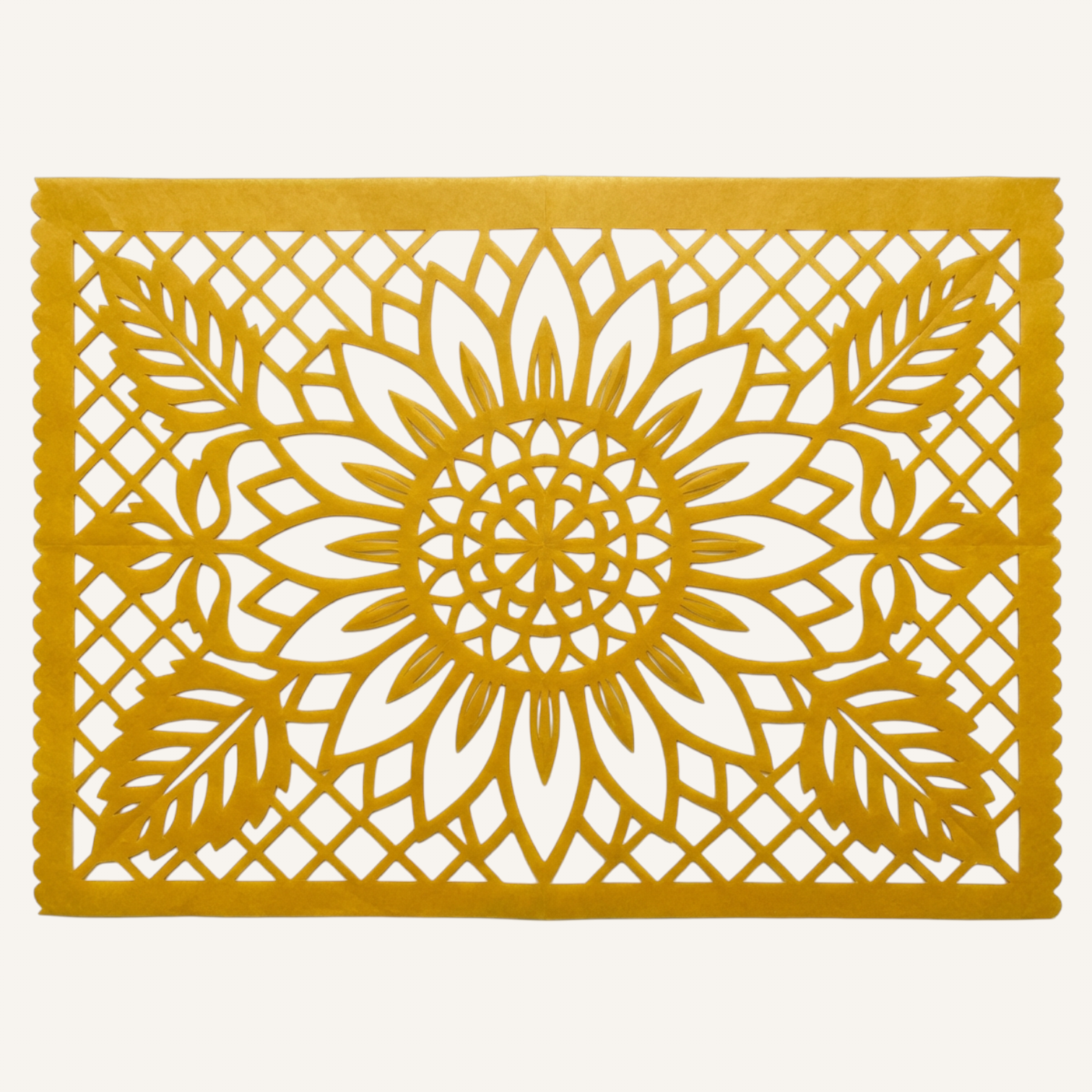 Papel picado artesanal con girasol detallado y follaje abundante en papel cempasúchil dorado
