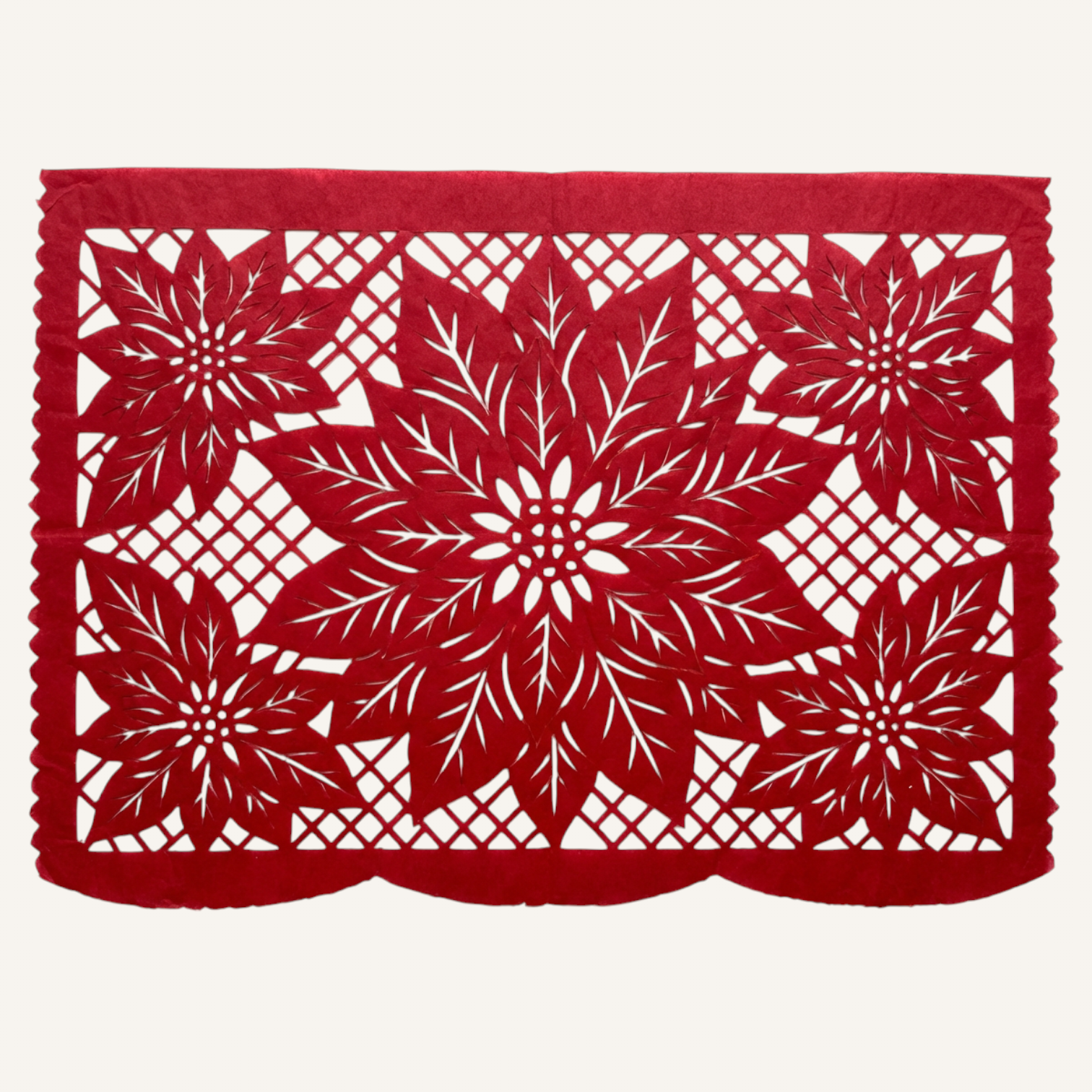 Papel picado artesanal con ramo de tres nochebuenas y follaje, estilo navideño mexicano