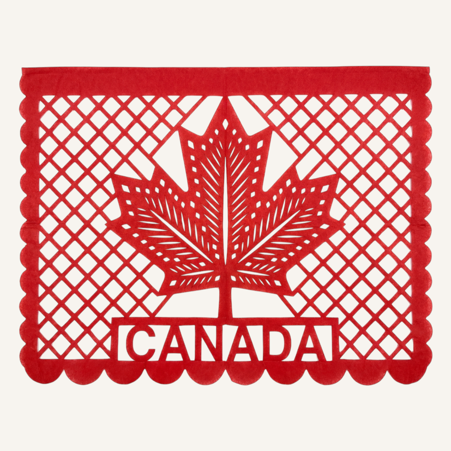 Papel picado artesanal con los colores de Canadá para el Mundial 2026